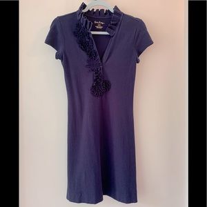 This navy blue dress is in excellent condition.
